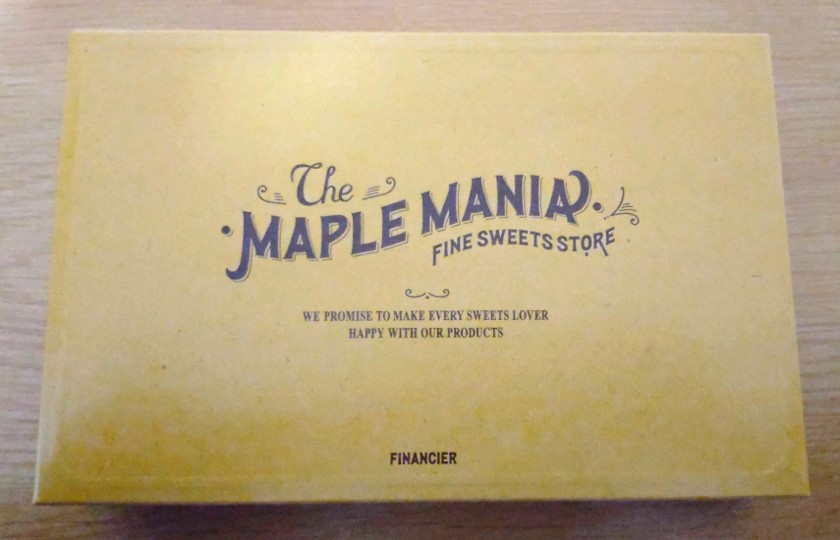 The MAPLE MANIA（ザ・メープルマニア）のメープルフィナンシェが入った箱の写真